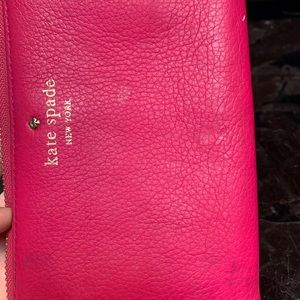 Fuchsia wallet with many spots